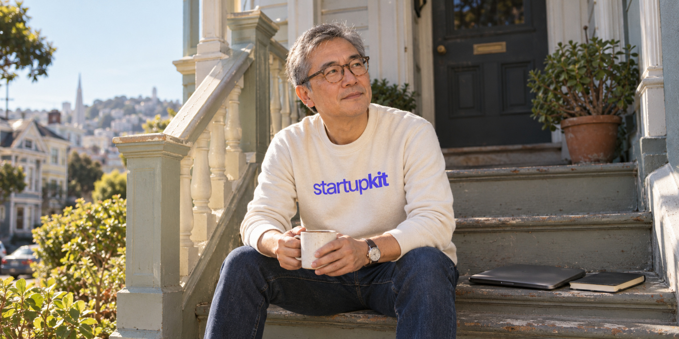 A founder reviewing a software renewal decision on the front steps of a San Francisco house.